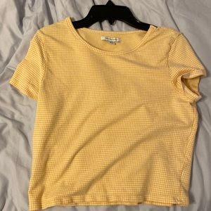 american eagle yellow and white checker top.